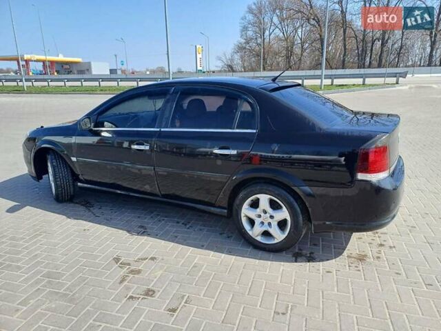Черный Опель Вектра, объемом двигателя 2.2 л и пробегом 300 тыс. км за 6100 $, фото 2 на Automoto.ua