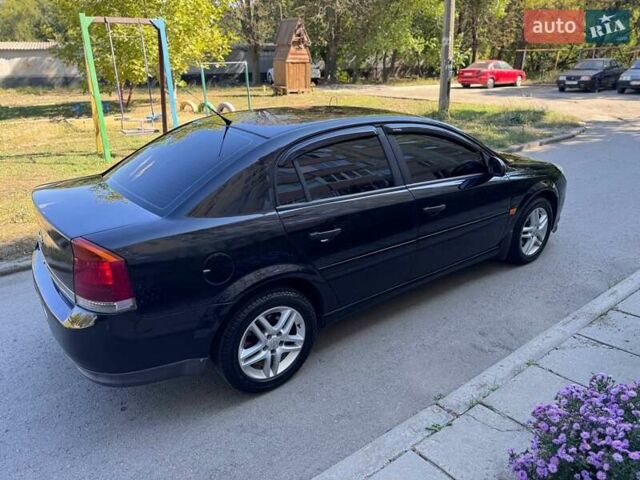 Чорний Опель Вектра, об'ємом двигуна 2.2 л та пробігом 209 тис. км за 4750 $, фото 4 на Automoto.ua