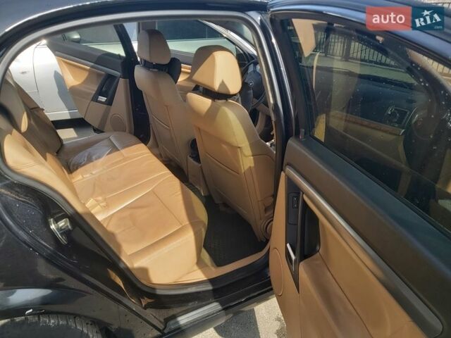 Черный Опель Вектра, объемом двигателя 2.2 л и пробегом 281 тыс. км за 3800 $, фото 7 на Automoto.ua