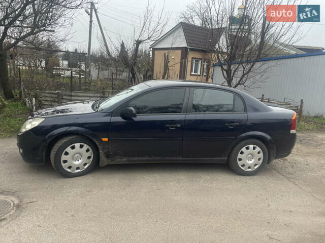 Черный Опель Вектра, объемом двигателя 2.2 л и пробегом 220 тыс. км за 3900 $, фото 1 на Automoto.ua