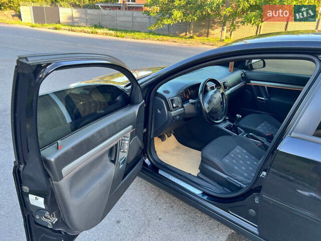 Черный Опель Вектра, объемом двигателя 1.9 л и пробегом 220 тыс. км за 5100 $, фото 10 на Automoto.ua