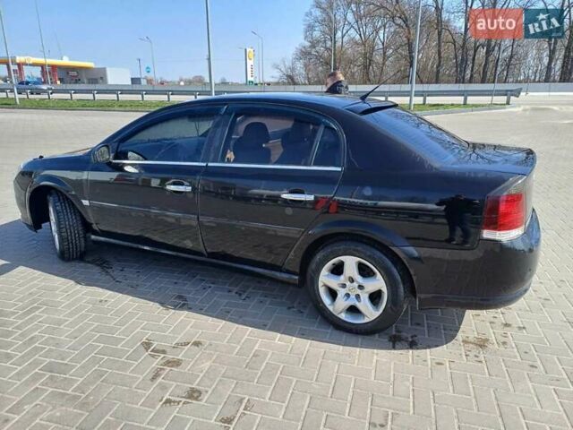 Черный Опель Вектра, объемом двигателя 2.2 л и пробегом 300 тыс. км за 6100 $, фото 1 на Automoto.ua