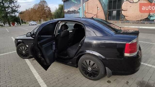 Черный Опель Вектра, объемом двигателя 2.2 л и пробегом 292 тыс. км за 3700 $, фото 23 на Automoto.ua