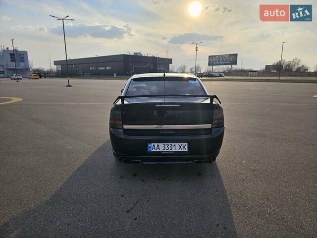 Черный Опель Вектра, объемом двигателя 2.2 л и пробегом 300 тыс. км за 7500 $, фото 4 на Automoto.ua