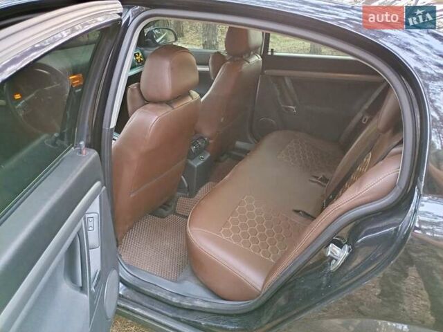 Черный Опель Вектра, объемом двигателя 2.2 л и пробегом 290 тыс. км за 3700 $, фото 12 на Automoto.ua