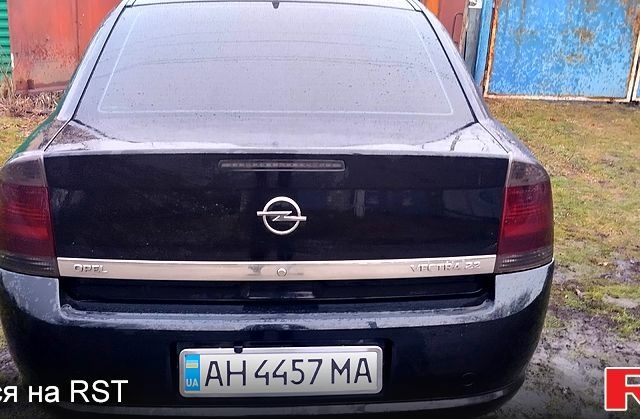 Черный Опель Вектра, объемом двигателя 2.2 л и пробегом 200 тыс. км за 6000 $, фото 1 на Automoto.ua