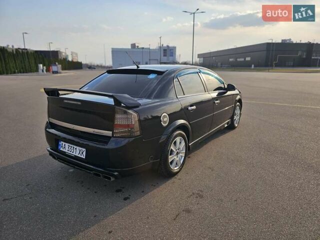 Черный Опель Вектра, объемом двигателя 2.2 л и пробегом 300 тыс. км за 7500 $, фото 5 на Automoto.ua