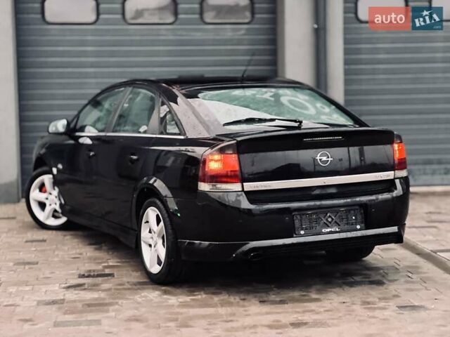 Черный Опель Вектра, объемом двигателя 1.91 л и пробегом 295 тыс. км за 4499 $, фото 11 на Automoto.ua