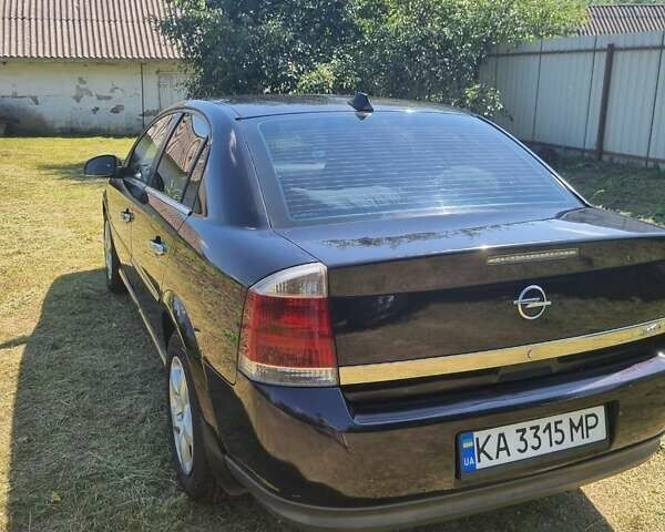 Черный Опель Вектра, объемом двигателя 2.2 л и пробегом 273 тыс. км за 4300 $, фото 6 на Automoto.ua