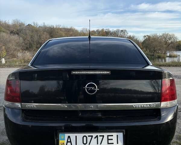 Черный Опель Вектра, объемом двигателя 2.2 л и пробегом 307 тыс. км за 5200 $, фото 2 на Automoto.ua
