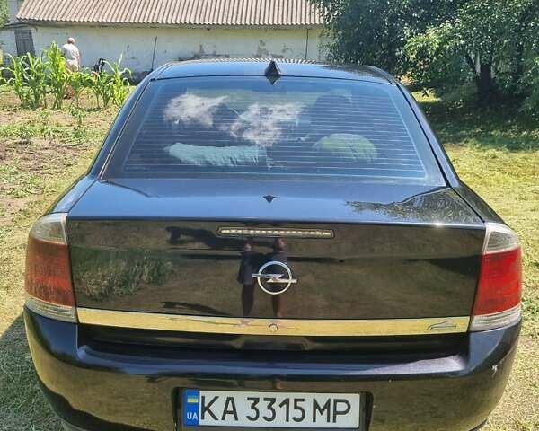 Черный Опель Вектра, объемом двигателя 2.2 л и пробегом 273 тыс. км за 4300 $, фото 7 на Automoto.ua