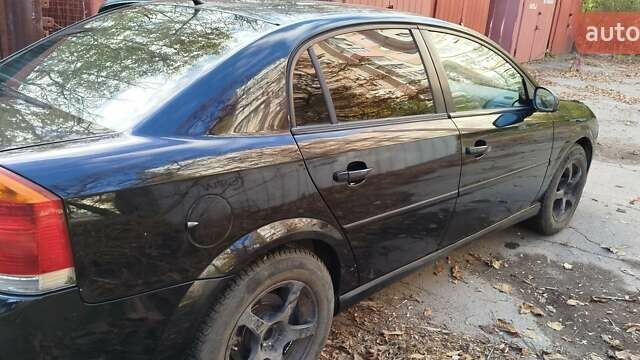 Черный Опель Вектра, объемом двигателя 2.2 л и пробегом 290 тыс. км за 6500 $, фото 1 на Automoto.ua