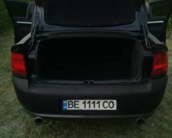 Черный Опель Вектра, объемом двигателя 2.2 л и пробегом 250 тыс. км за 8000 $, фото 7 на Automoto.ua