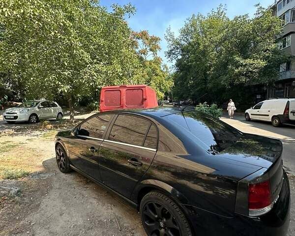 Черный Опель Вектра, объемом двигателя 2.2 л и пробегом 167 тыс. км за 6600 $, фото 4 на Automoto.ua