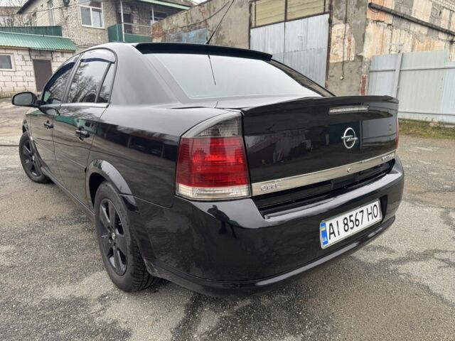 Черный Опель Вектра, объемом двигателя 2.2 л и пробегом 250 тыс. км за 5990 $, фото 1 на Automoto.ua