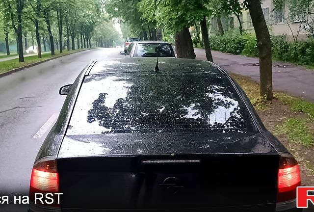 Черный Опель Вектра, объемом двигателя 2.2 л и пробегом 297 тыс. км за 5000 $, фото 2 на Automoto.ua