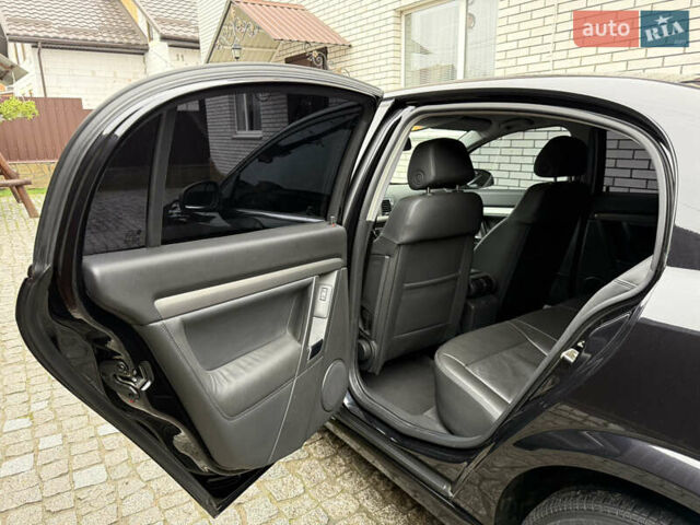 Чорний Опель Вектра, об'ємом двигуна 2.2 л та пробігом 33 тис. км за 9500 $, фото 39 на Automoto.ua