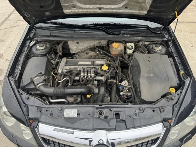 Черный Опель Вектра, объемом двигателя 2.2 л и пробегом 250 тыс. км за 5990 $, фото 9 на Automoto.ua