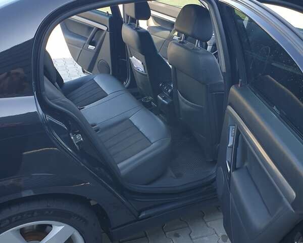 Чорний Опель Вектра, об'ємом двигуна 2.2 л та пробігом 244 тис. км за 7500 $, фото 5 на Automoto.ua