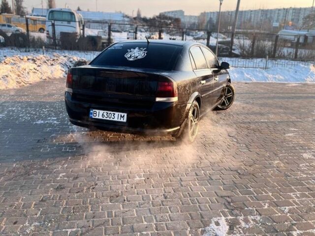Черный Опель Вектра, объемом двигателя 2.2 л и пробегом 246 тыс. км за 5000 $, фото 1 на Automoto.ua
