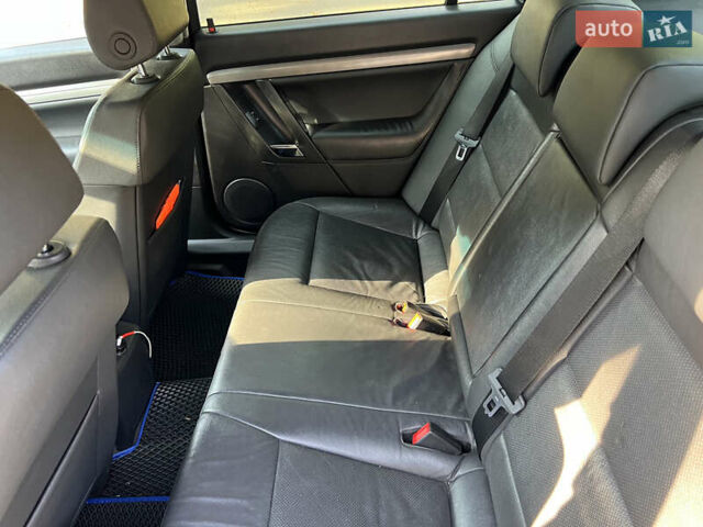 Черный Опель Вектра, объемом двигателя 2.2 л и пробегом 235 тыс. км за 6200 $, фото 6 на Automoto.ua