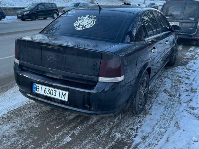 Черный Опель Вектра, объемом двигателя 2.2 л и пробегом 246 тыс. км за 5000 $, фото 5 на Automoto.ua