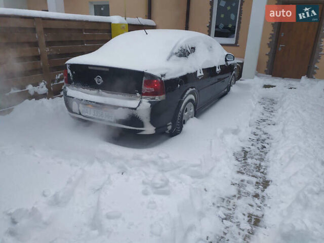 Чорний Опель Вектра, об'ємом двигуна 2.2 л та пробігом 265 тис. км за 7399 $, фото 27 на Automoto.ua