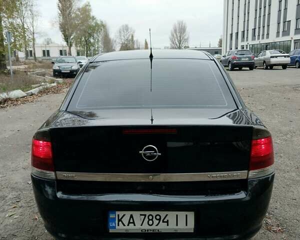 Черный Опель Вектра, объемом двигателя 2.2 л и пробегом 251 тыс. км за 4600 $, фото 1 на Automoto.ua