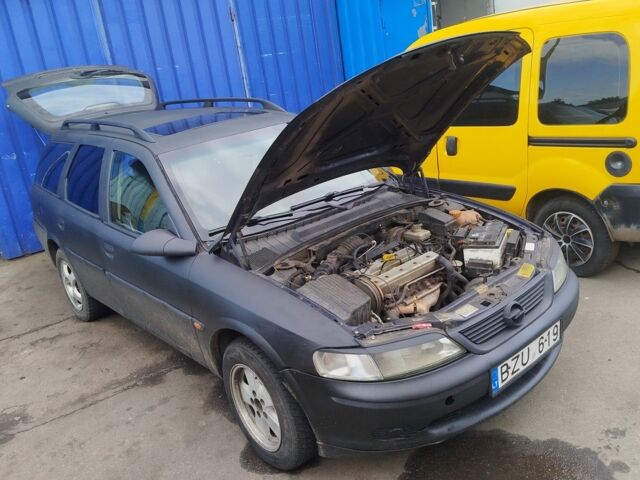 Черный Опель Вектра, объемом двигателя 2 л и пробегом 330 тыс. км за 600 $, фото 5 на Automoto.ua