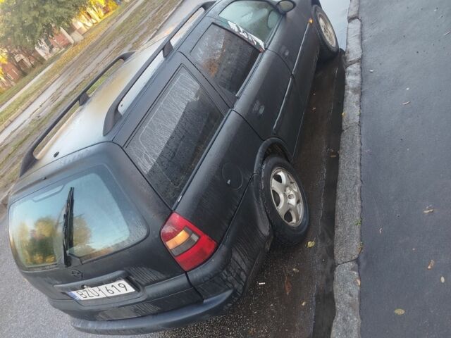 Черный Опель Вектра, объемом двигателя 2 л и пробегом 330 тыс. км за 600 $, фото 3 на Automoto.ua