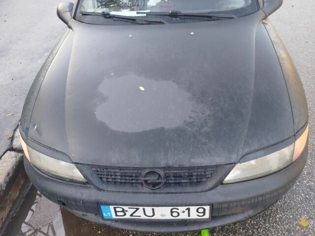 Черный Опель Вектра, объемом двигателя 2 л и пробегом 330 тыс. км за 600 $, фото 1 на Automoto.ua