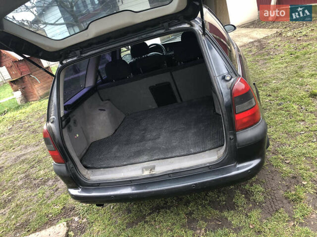 Чорний Опель Вектра, об'ємом двигуна 1.8 л та пробігом 296 тис. км за 1500 $, фото 9 на Automoto.ua