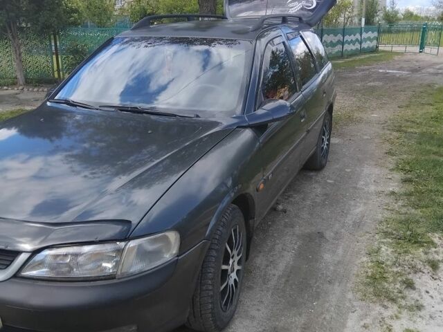 Чорний Опель Вектра, об'ємом двигуна 2 л та пробігом 352 тис. км за 1750 $, фото 1 на Automoto.ua