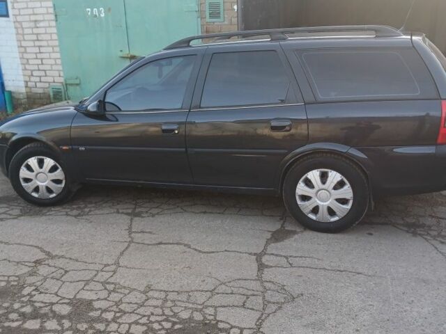 Черный Опель Вектра, объемом двигателя 1.8 л и пробегом 240 тыс. км за 4600 $, фото 5 на Automoto.ua