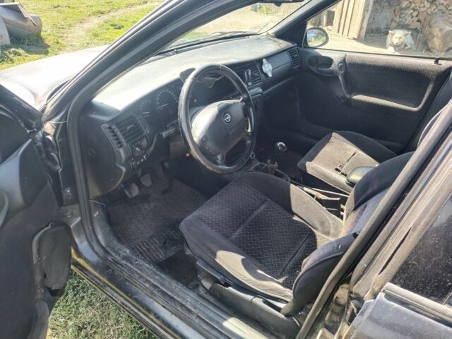 Черный Опель Вектра, объемом двигателя 0 л и пробегом 412 тыс. км за 450 $, фото 6 на Automoto.ua