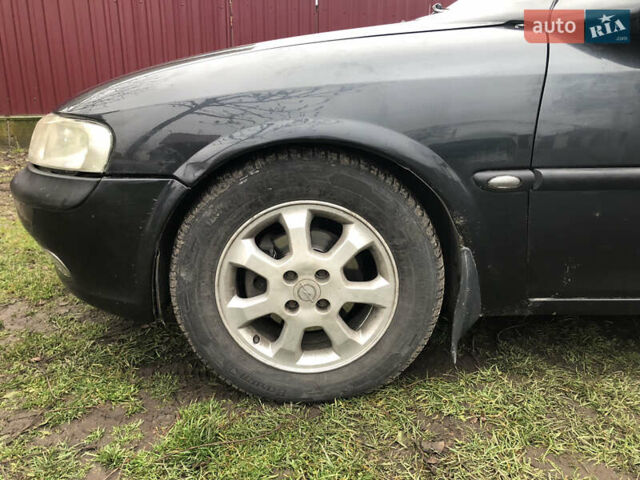 Чорний Опель Вектра, об'ємом двигуна 1.8 л та пробігом 296 тис. км за 1500 $, фото 6 на Automoto.ua