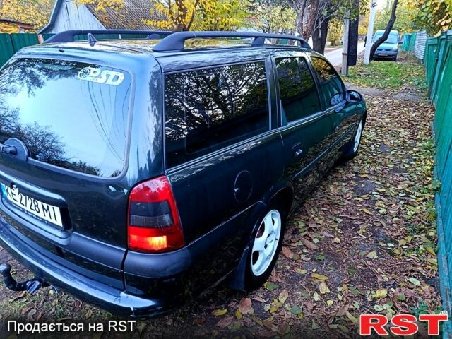 Черный Опель Вектра, объемом двигателя 1.8 л и пробегом 200 тыс. км за 2200 $, фото 1 на Automoto.ua