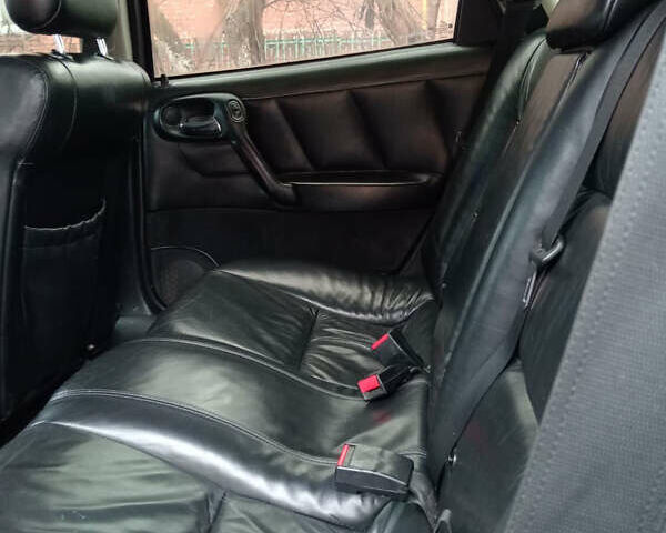 Черный Опель Вектра, объемом двигателя 2 л и пробегом 300 тыс. км за 3300 $, фото 7 на Automoto.ua