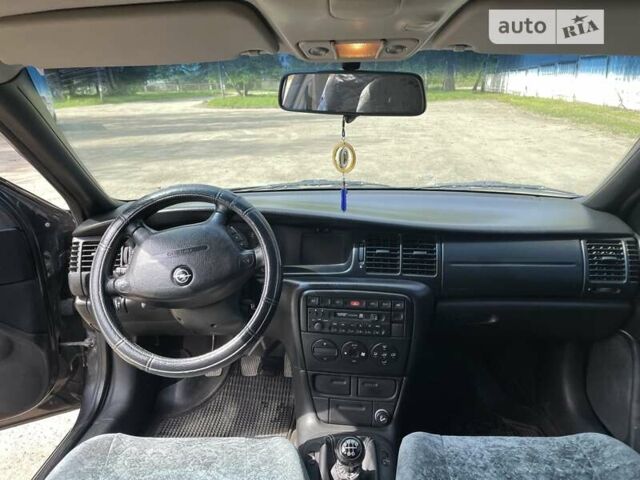 Черный Опель Вектра, объемом двигателя 2 л и пробегом 344 тыс. км за 4300 $, фото 4 на Automoto.ua