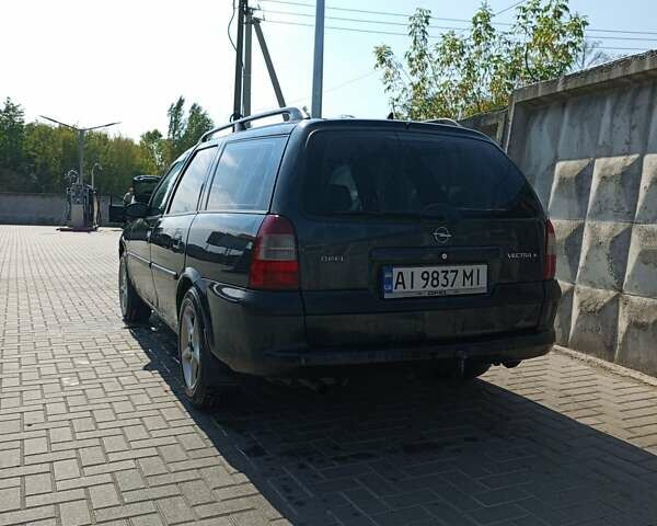 Черный Опель Вектра, объемом двигателя 1.6 л и пробегом 364 тыс. км за 1100 $, фото 2 на Automoto.ua