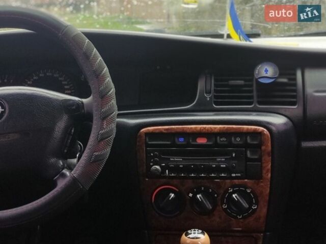 Черный Опель Вектра, объемом двигателя 1.6 л и пробегом 322 тыс. км за 1550 $, фото 21 на Automoto.ua