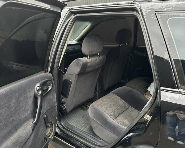 Черный Опель Вектра, объемом двигателя 2 л и пробегом 300 тыс. км за 1000 $, фото 7 на Automoto.ua