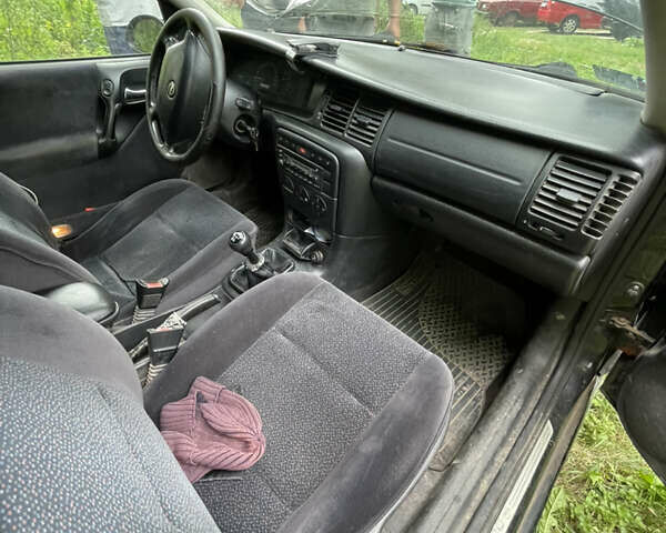 Черный Опель Вектра, объемом двигателя 1.8 л и пробегом 335 тыс. км за 2250 $, фото 8 на Automoto.ua