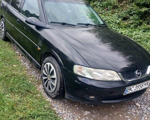 Черный Опель Вектра, объемом двигателя 1.8 л и пробегом 251 тыс. км за 1650 $, фото 1 на Automoto.ua