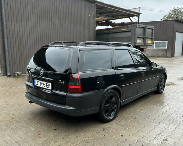 Черный Опель Вектра, объемом двигателя 2 л и пробегом 300 тыс. км за 1000 $, фото 2 на Automoto.ua