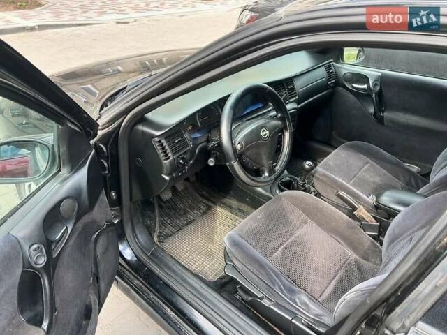 Чорний Опель Вектра, об'ємом двигуна 2 л та пробігом 300 тис. км за 1450 $, фото 2 на Automoto.ua