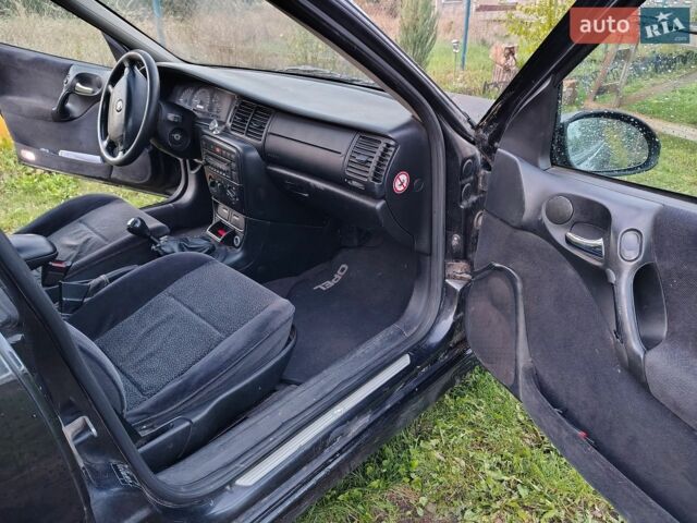 Черный Опель Вектра, объемом двигателя 1.8 л и пробегом 325 тыс. км за 2800 $, фото 10 на Automoto.ua
