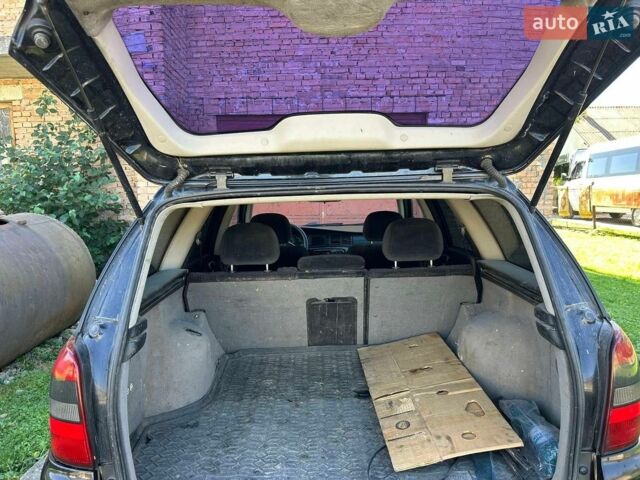 Чорний Опель Вектра, об'ємом двигуна 2 л та пробігом 300 тис. км за 1999 $, фото 10 на Automoto.ua