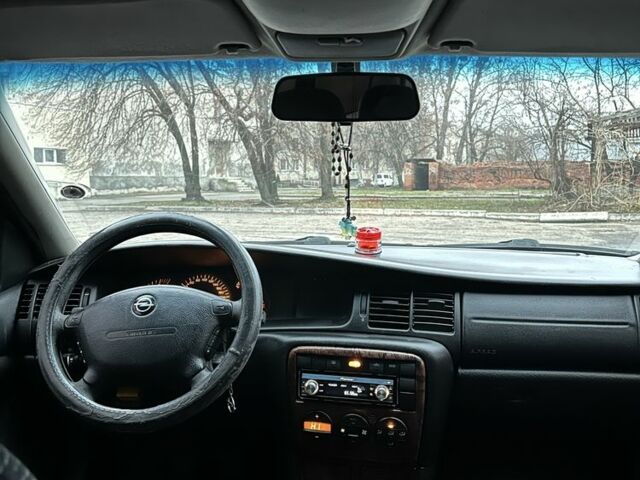 Черный Опель Вектра, объемом двигателя 2 л и пробегом 300 тыс. км за 1800 $, фото 7 на Automoto.ua