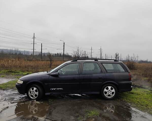 Черный Опель Вектра, объемом двигателя 1.6 л и пробегом 333 тыс. км за 1999 $, фото 1 на Automoto.ua